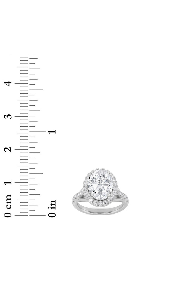 3Cttw Oval Shaped Lab Grown Diamond (F/VS) Halo Accented Engagement Ring in 14K Gold