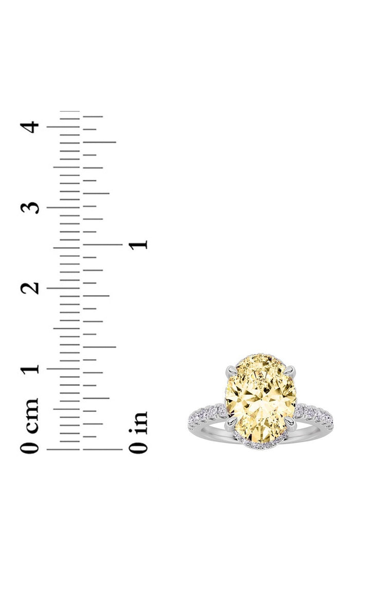 2Cttw Oval Shaped Lab Grown Diamond (F/VS) Halo Accented Engagement Ring in 14K Gold