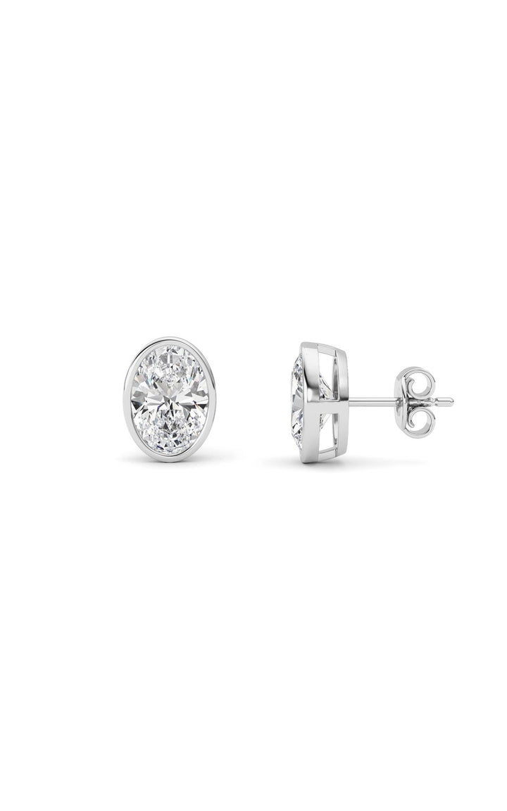 4Cttw Oval Shaped Lab Grown Diamond (F/VS) Bezel Set Stud Earrings in 14K Gold
