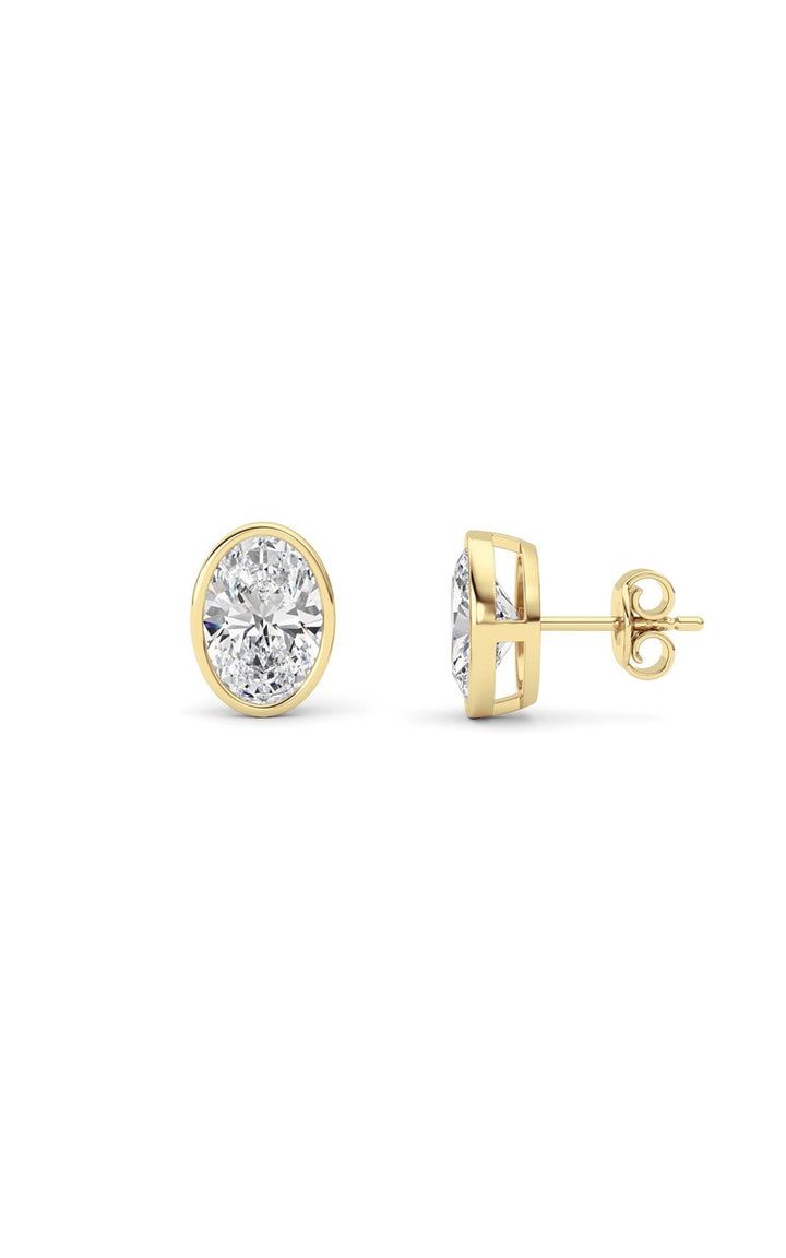 4Cttw Oval Shaped Lab Grown Diamond (F/VS) Bezel Set Stud Earrings in 14K Gold